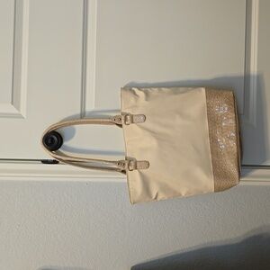 Unbranded Tote in a neutral ivory color. Very clean. Never used. PVC